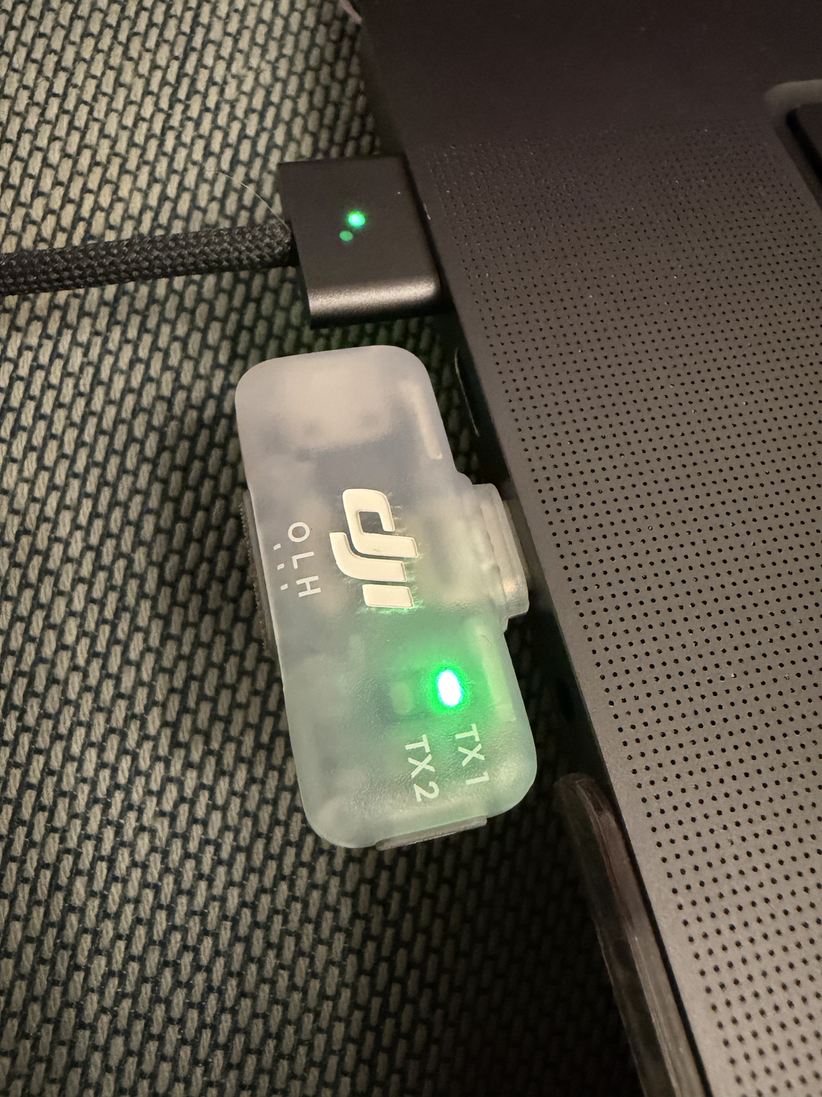 The DJI Mic Mini receiver plugged into my laptop's USB-C port