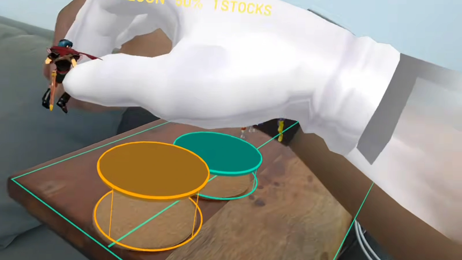 My tracked hand wearing the Master Hand glove and holding Marth above colored coaster platforms